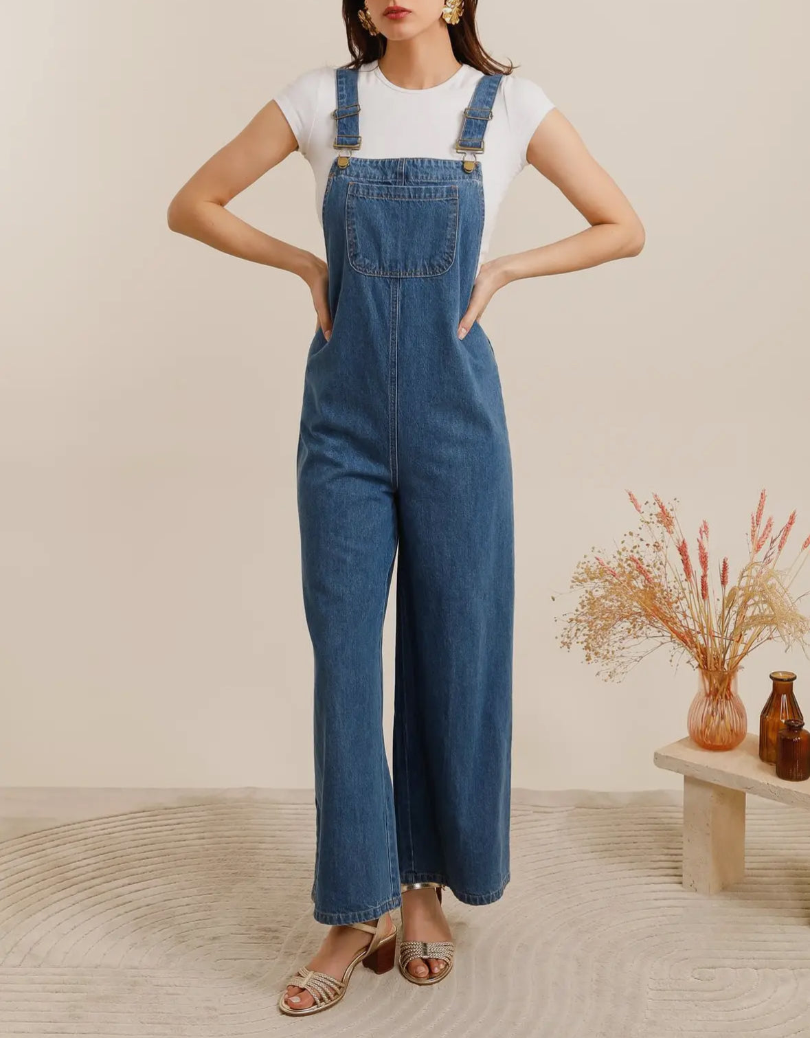 Salopette di jeans blu scuro a gamba ampia