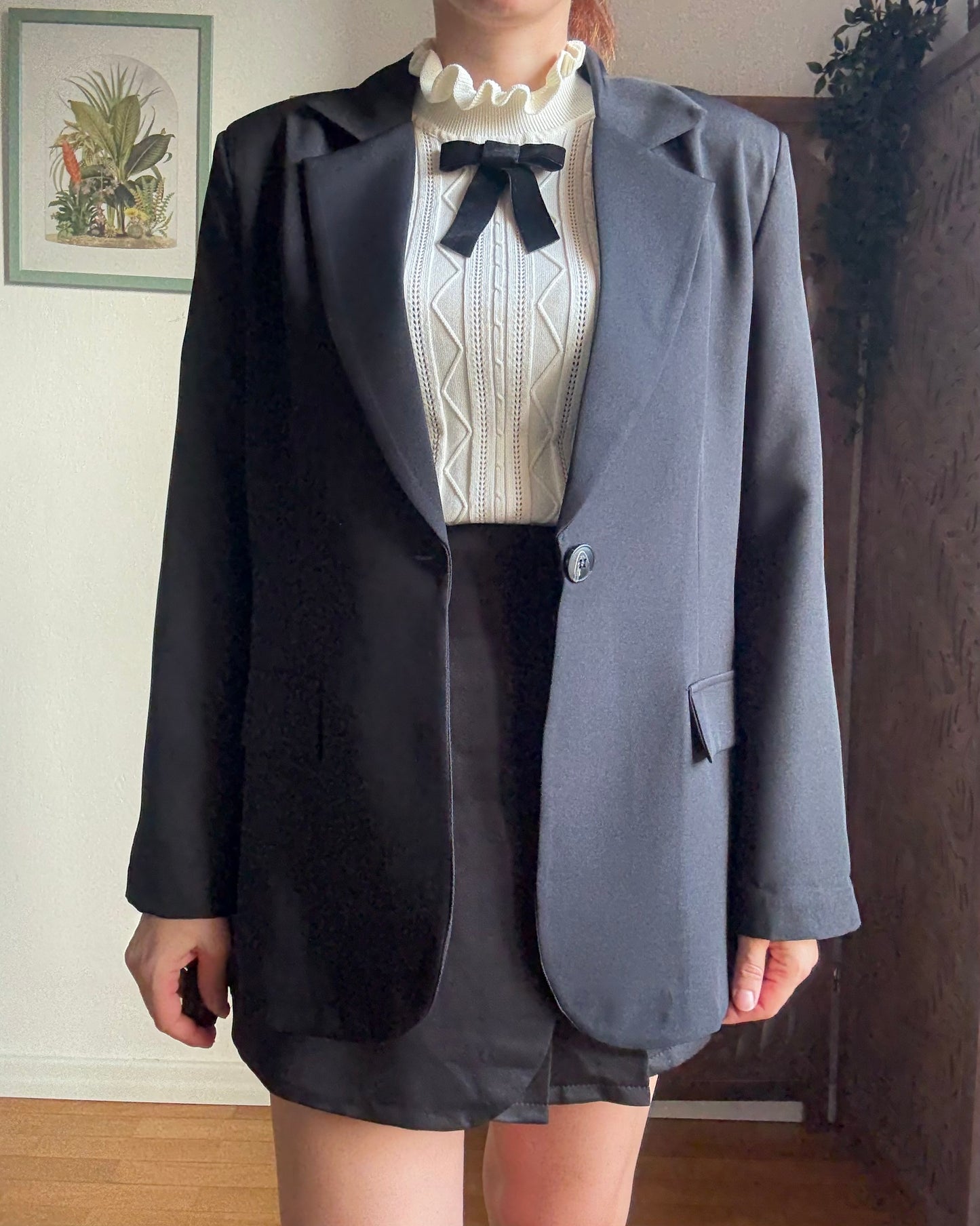 Blazer nero dritto a un bottone