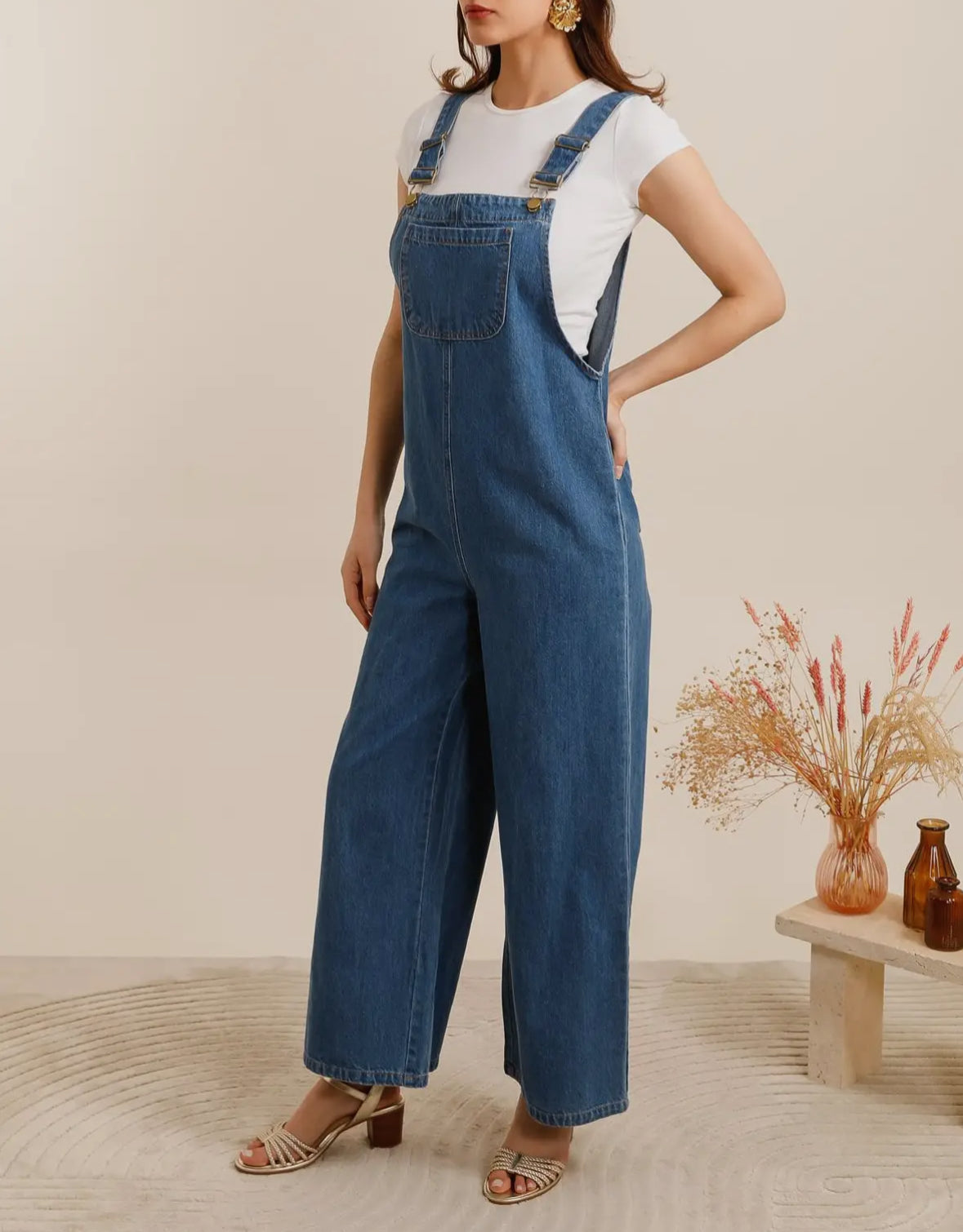 Salopette di jeans blu scuro a gamba ampia