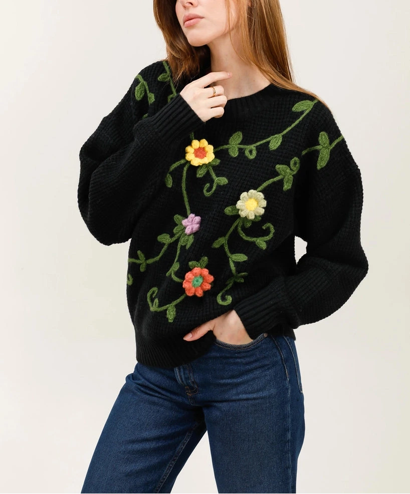 Maglione francese in maglia nero con ricami floreali tridimensionali