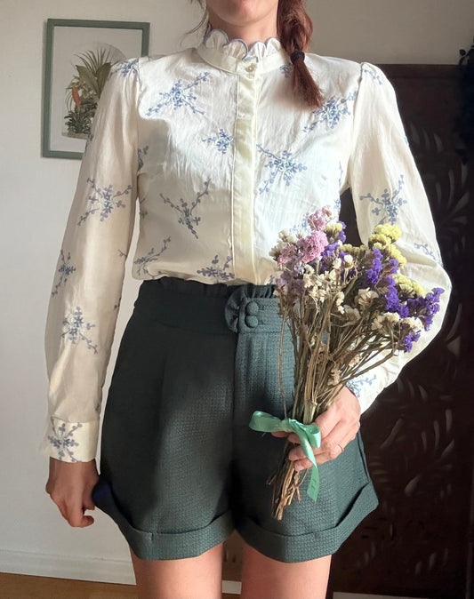 Shorts a revers con volant verdi