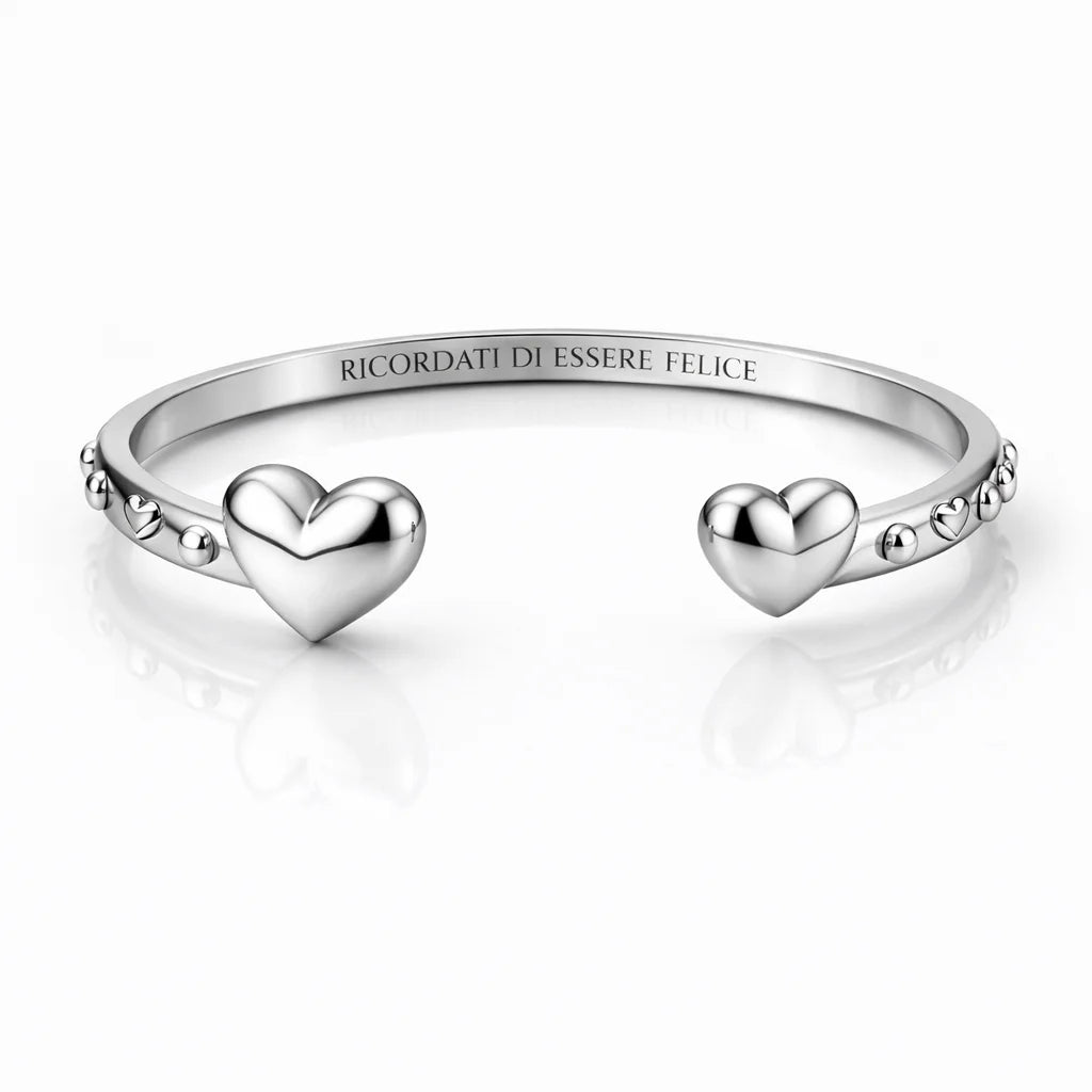Bracciale “Ricordati di essere felice” con due cuori in acciaio 316L