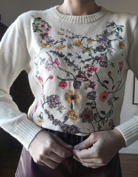 Maglione donna Flower Bomb bianco.