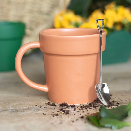 Vaso da fiori semplice, tazza in ceramica e cucchiaio a forma di paletta