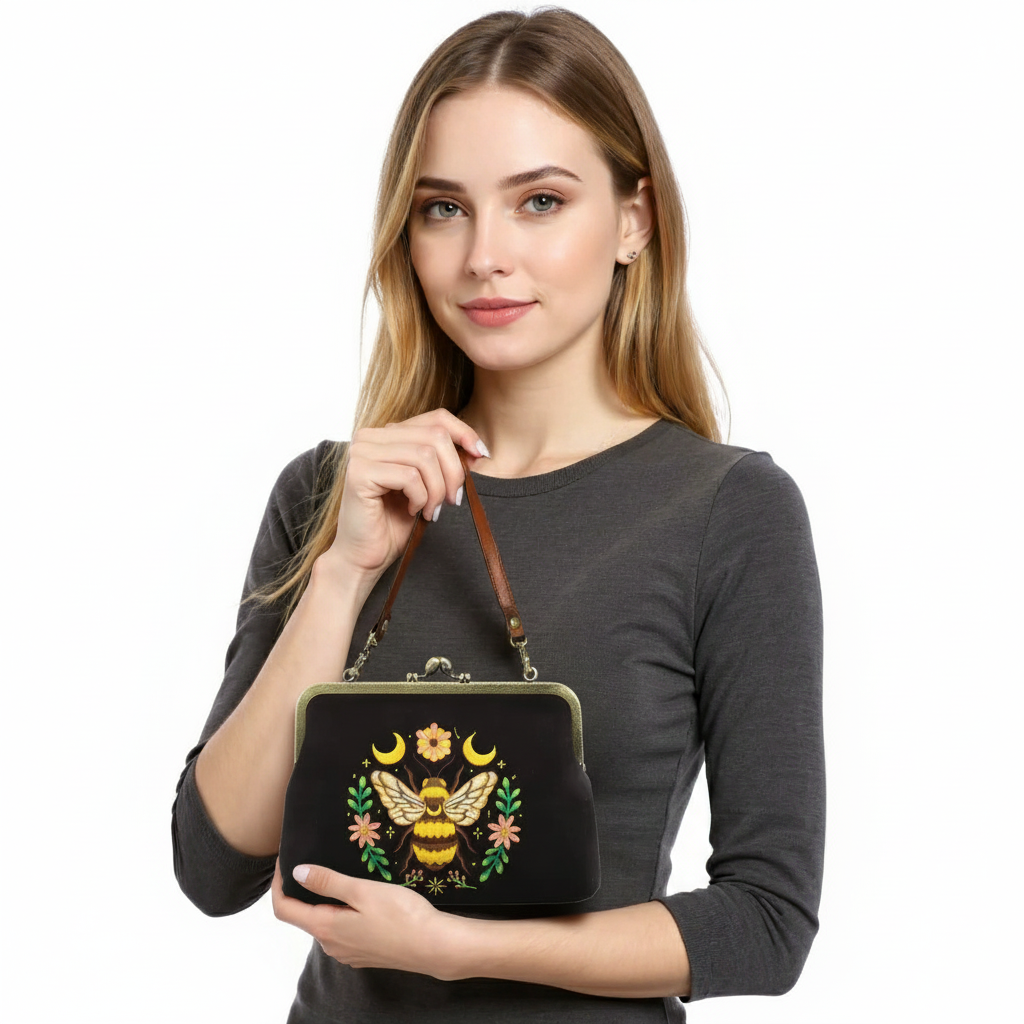 Borsetta kisslock Bee in misto lino e cotone ricamata in 2 colori