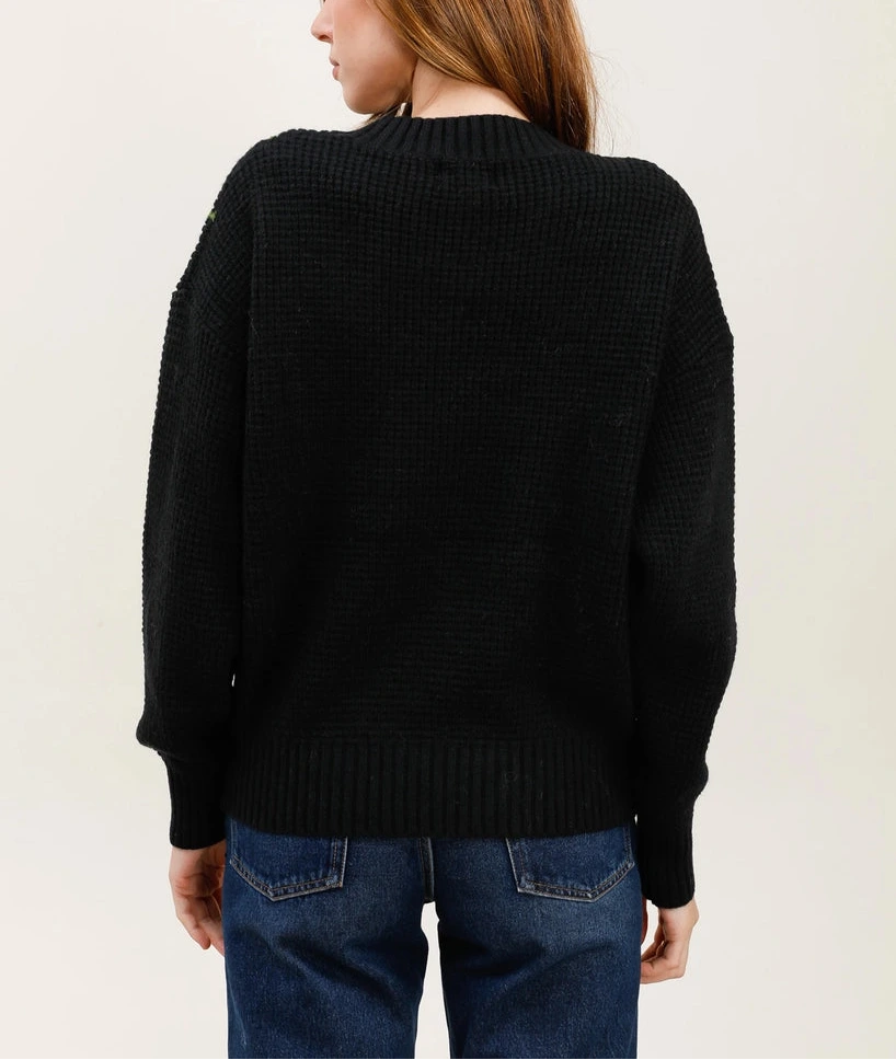 Maglione francese in maglia nero con ricami floreali tridimensionali